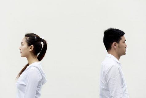 two people facing away from each other